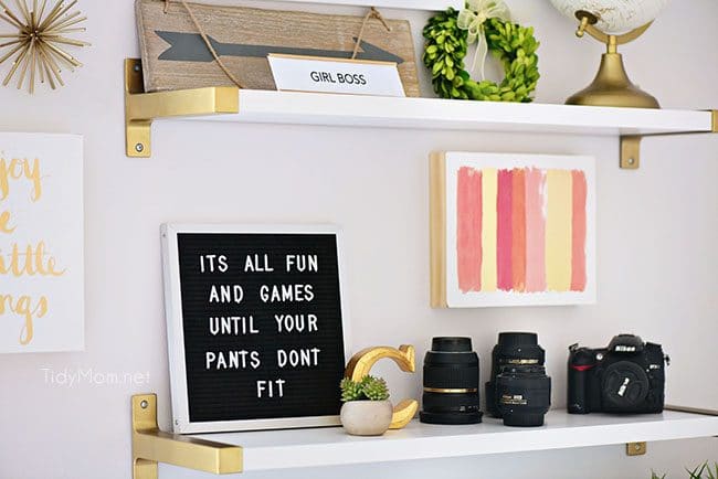 Decorating a shared office, with colorful industrial style. Her side is pink and gold, while his is black and neutrals. Check out the gold coffee cart!! Get all the details of this shared home office space at TidyMom.net