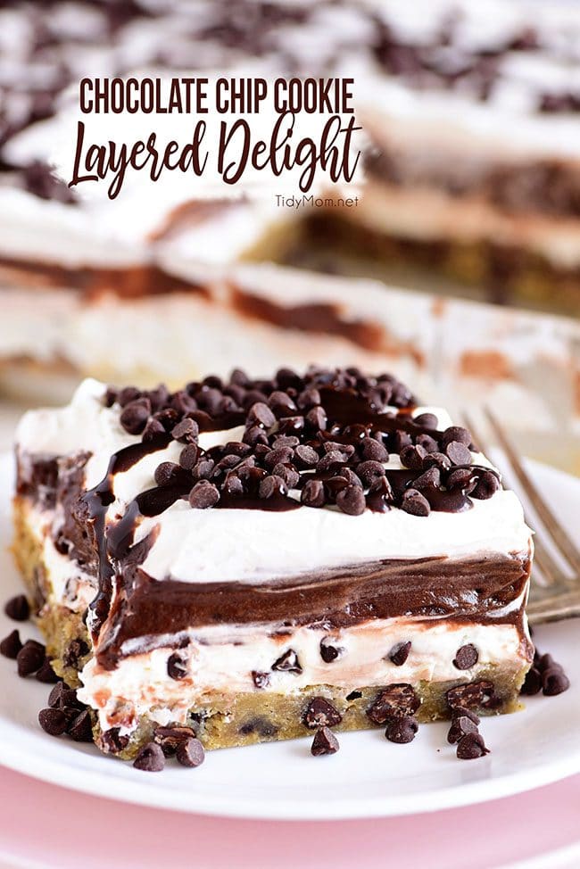 Chocolate Chip Cookie Layered Delight is four layers of pure bliss. This chilled dessert starts with a chocolate chip cookie bottom that is topped with a chocolate chip cream cheese, double chocolate pudding topped with a creamy layer garnished with more chocolate chips! This is the dessert of your dreams!! Print the recipe at Tidymom.net