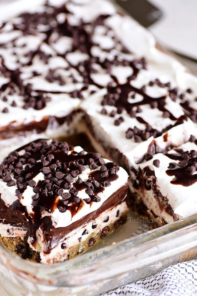 Chocolate Chip Cookie Layered Delight piece cut in baking dish