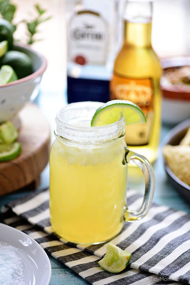 This easy recipe for a Beer Margarita has only 3 ingredients and is dripping with Mexican flavors. The best Beergarita is light, not too sweet, refreshing and super easy, to make! When you combine tequila, beer, and frozen limeade, you have something for the cocktail lover and brewski lover. Perfect for Cinco de Mayo or any celebration! Get this #cocktailrecipe at TidyMom.net #margarita #cocktails