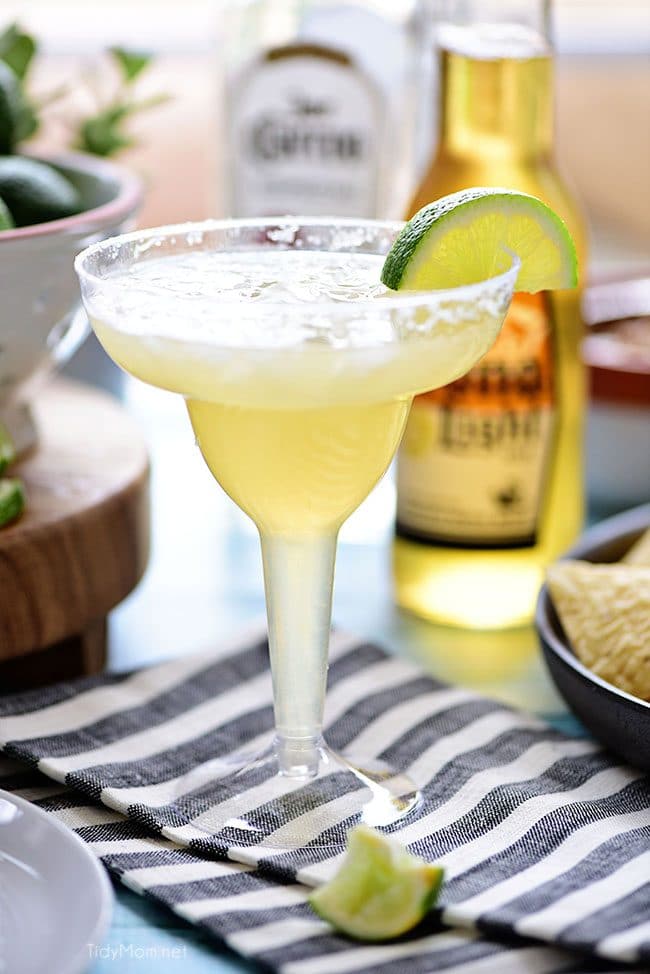 This easy recipe for a Beer Margarita has only 3 ingredients and is dripping with Mexican flavors. The best Beergarita is light, not too sweet, refreshing and super easy, to make! When you combine tequila, beer, and frozen limeade, you have something for the cocktail lover and brewski lover. Perfect for Cinco de Mayo or any celebration! Get this #cocktailrecipe at TidyMom.net #margarita #cocktails