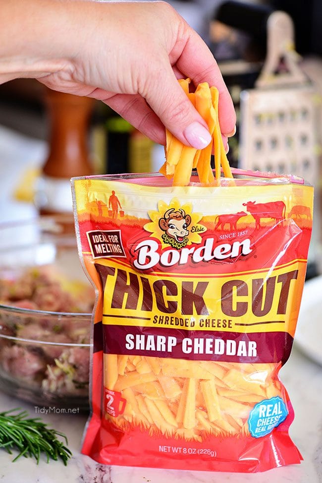 Borden Thick Cut Shredded Cheese takes these Apple Cheddar Pork Burgers a whole new dimension