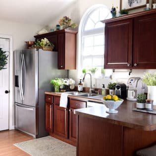 kitchen with cherry cabinets and creamy white walls