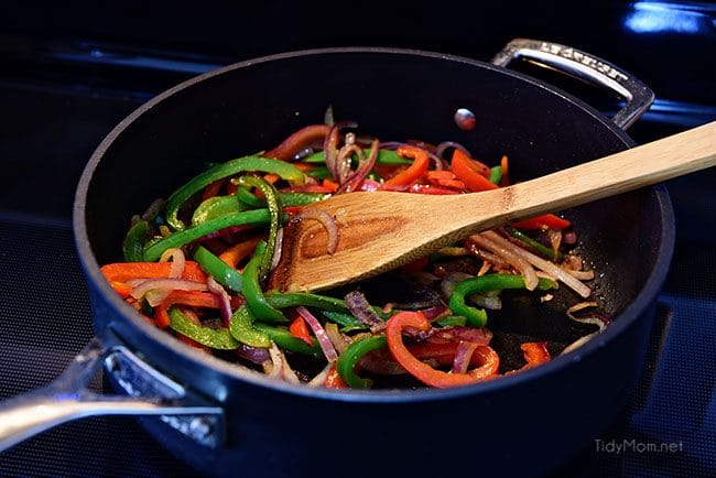 cooked veggies for pineapple chicken quesadillas in a skillet