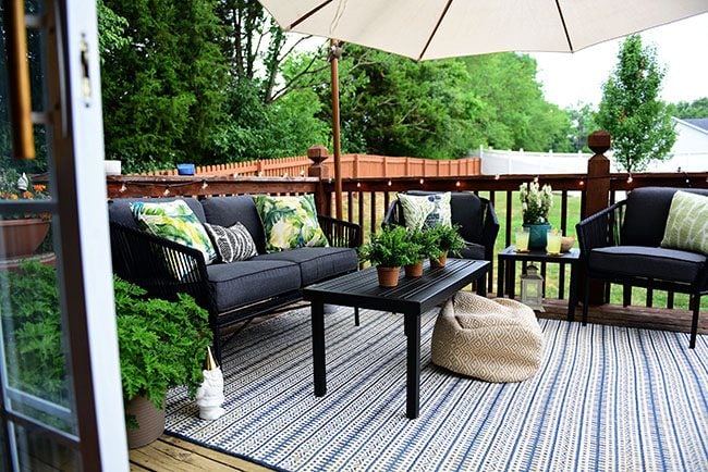 Maximize Outdoor Space! Learn How to Decorate a Small Deck or Patio and what kind of plants to use to keep mosquitos and other pests away. Get all the details at TidyMom.net