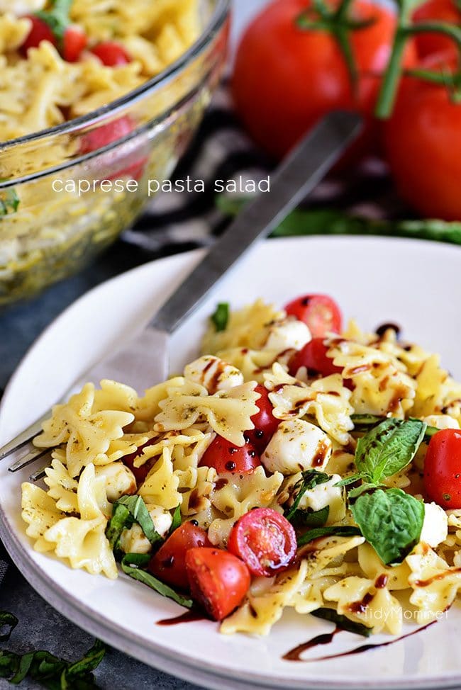 Caprese Pasta Salad is fresh, easy and a perfectly simple for summer potlucks and BBQs. It has all the flavors of a traditional Caprese salad in pasta form!