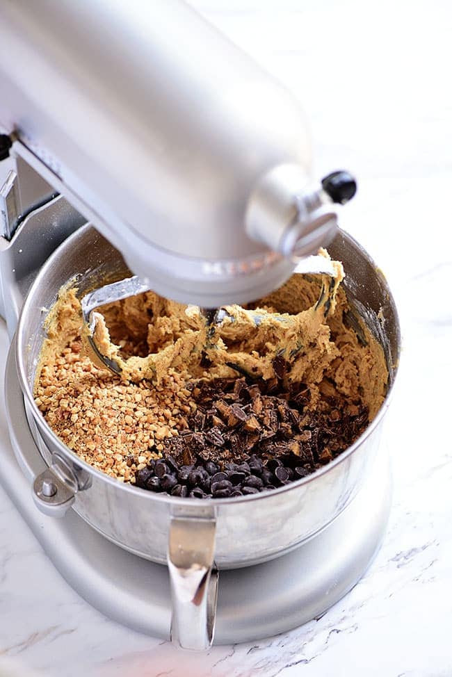 Mixing the dough for Peanut Butter Blowout Cookies with an electric mixer