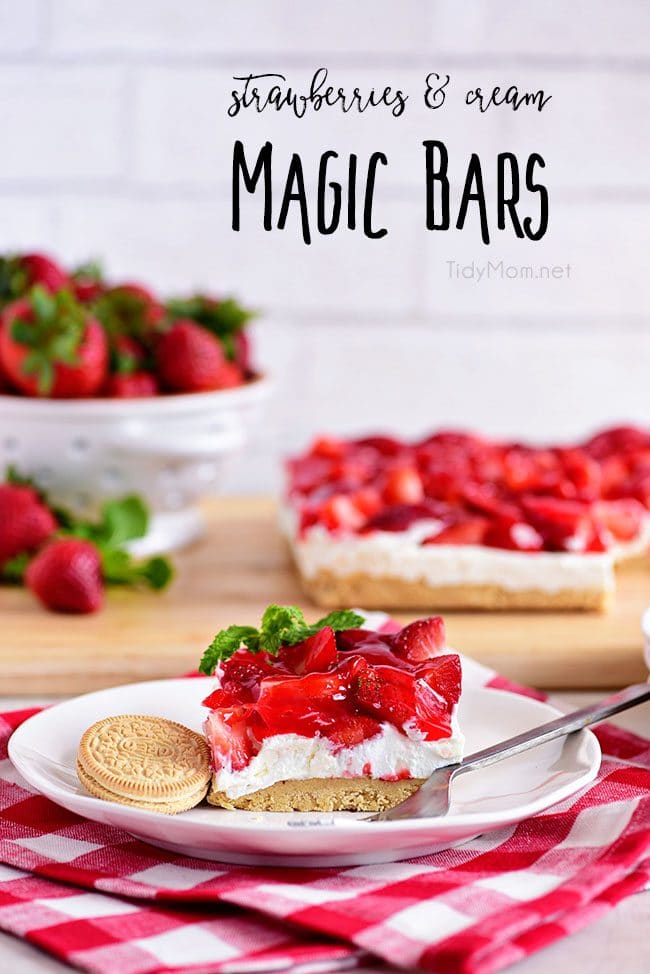 Strawberries and Cream Magic Bars made with fresh glazed strawberries and a sweet cream cheese layer with a Golden Oreo cookie crust! Chill for a tasty summer dessert!  Print the full recipe at TidyMom.net #strawberry #magicbars #dessert