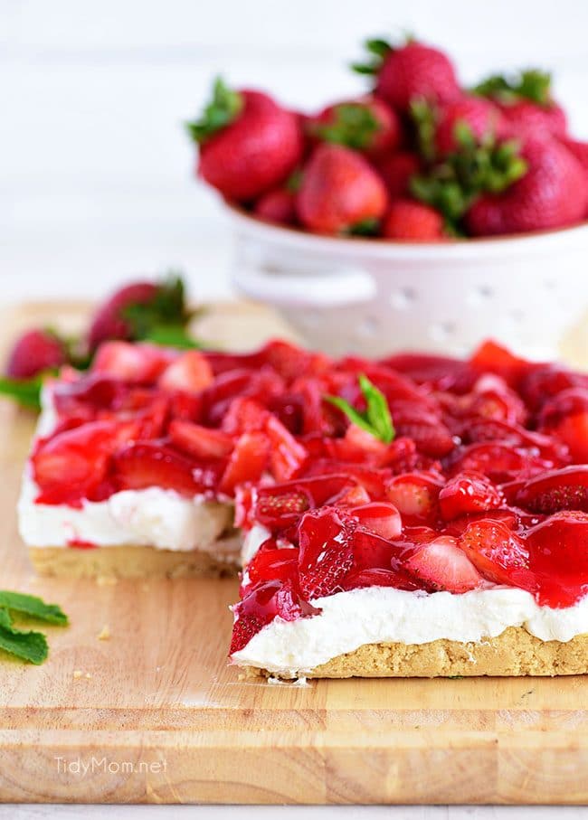 Strawberries and Cream Magic Bars made with fresh glazed strawberries and a sweet cream cheese layer with a Golden Oreo crust! 