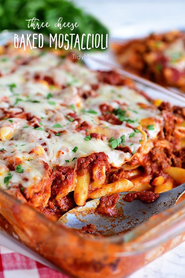 This family recipe for Three Cheese Baked Mostaccioli is a wonderful cheesy pasta dish the whole family will be asking for again and again! Get the full recipe + video at TidyMom.net #mostaccioli #pasta #cheese #familyrecipe #homemade