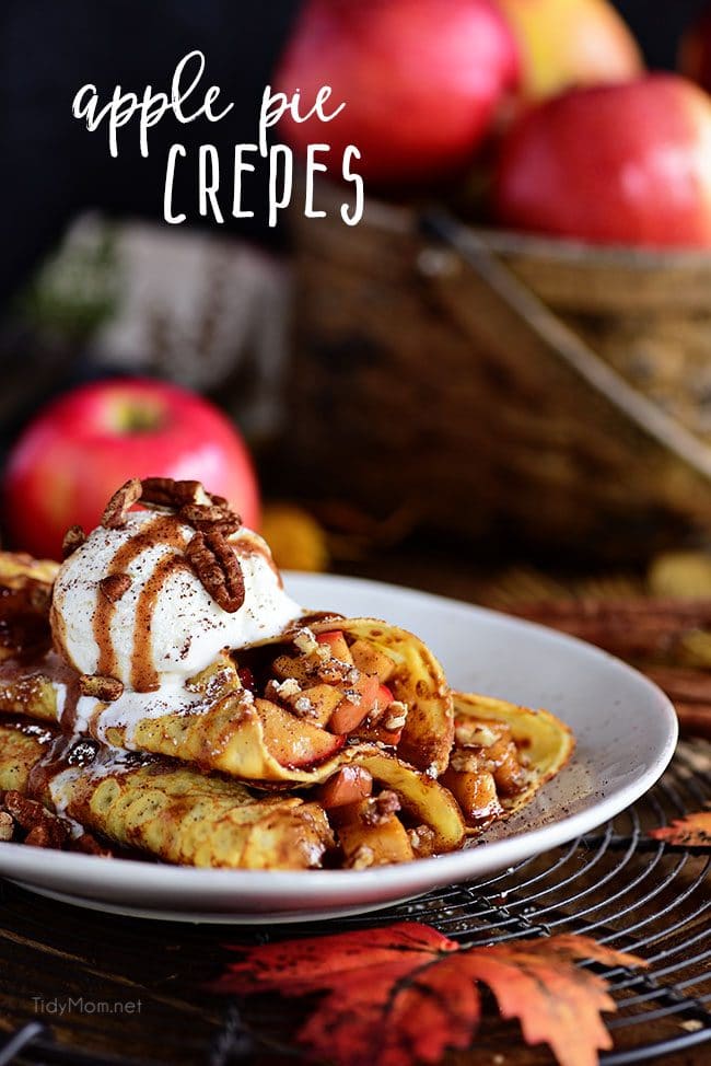 Apple Pie Crepes are thin french pancakes filled with a gooey caramel apple compote and toasted cinnamon pecans. Top with ice cream for the perfect dessert crepes.