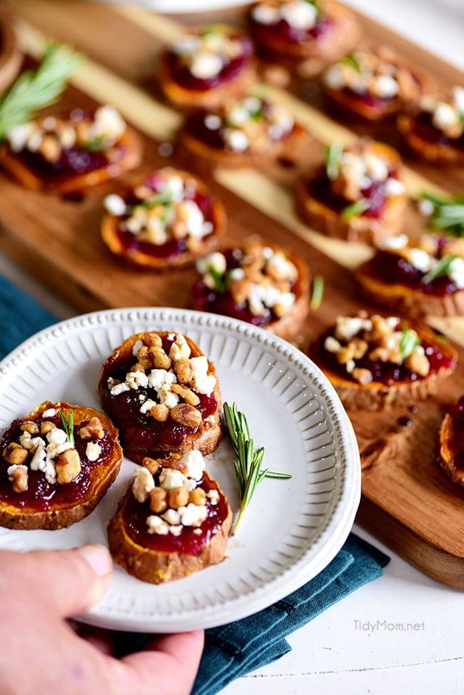 Cranberry Walnut Sweet Potato Rounds appetizer on plate and tray