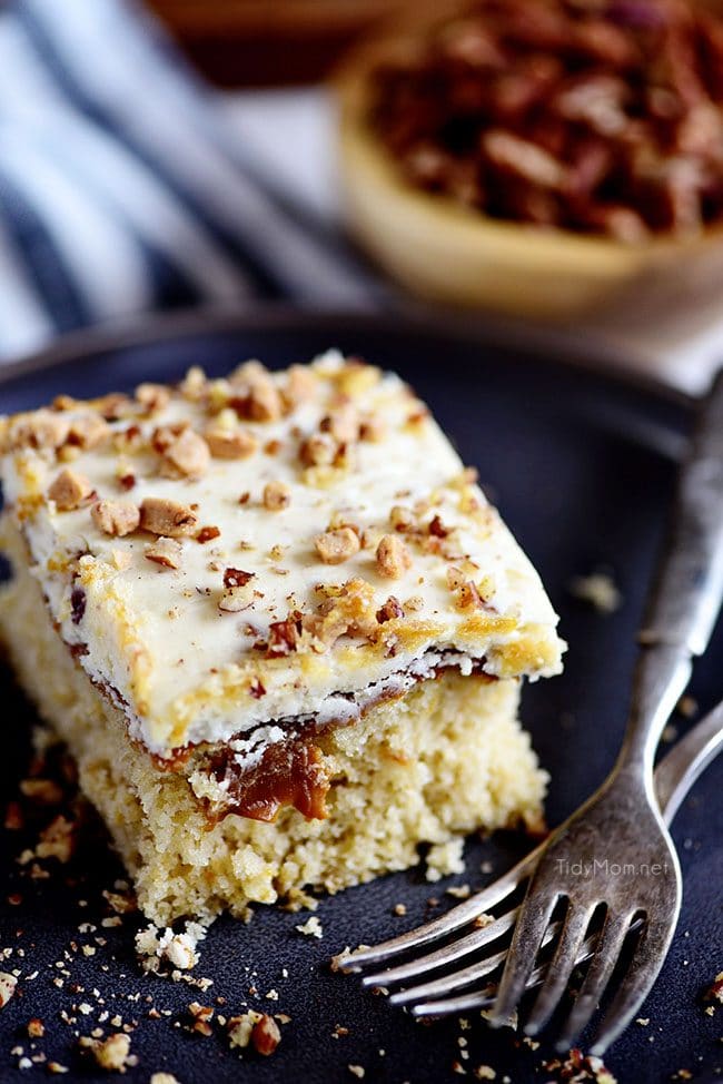 Caramel Butter Pecan Cake on black plate with forks