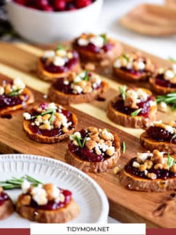 cranberry sweet potato appetizer on a wood tray