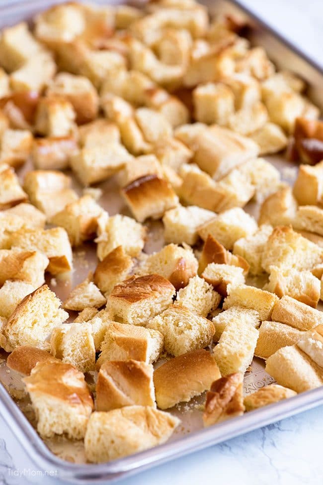 bread cubes on baking sheet