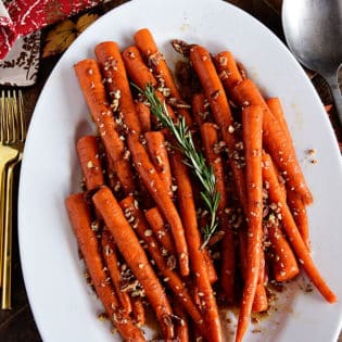 Pecan Pie Glazed Carrots on table