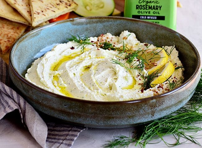 whipped feta in bowl with lemon and olive oil