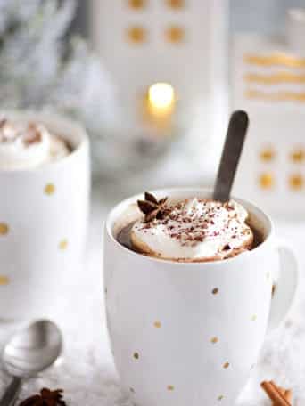 Butterscotch Schnapps Spiked Hot Chocolate in mugs with spoon