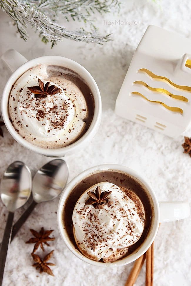 Butterscotch Schnapps Spiked Hot Chocolate in mugs with whip cream on top