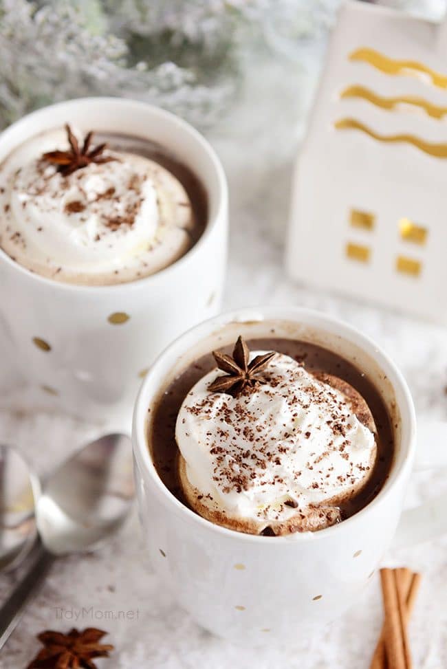 two mugs Butterscotch Schnapps Spiked Hot Chocolate with whipped cream