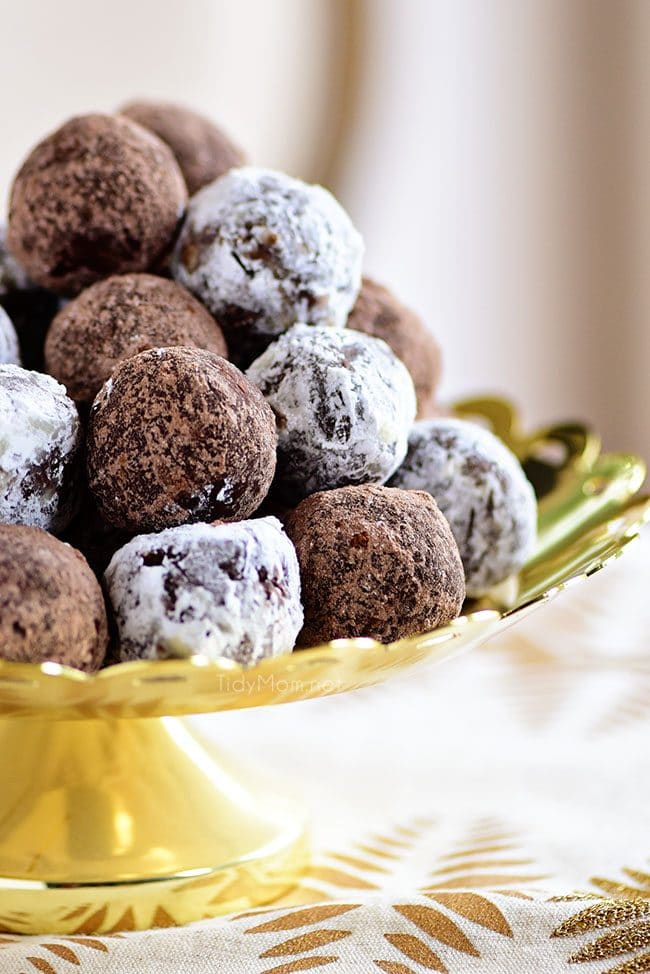easy Rum Balls piled on gold tray
