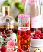 Raspberry Kir Royale cocktail in champagne flute