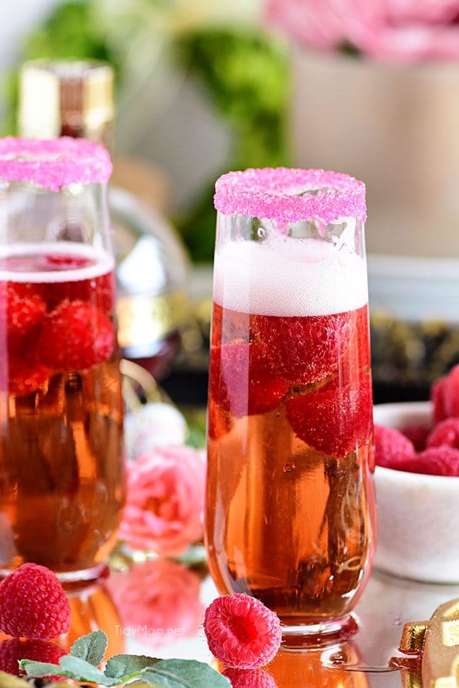 Raspberry Kir Royale cocktail with fresh raspberries