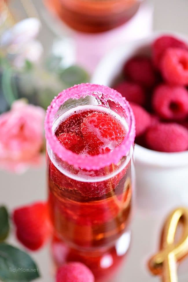 looking into glass of Raspberry Kir Royale cocktail