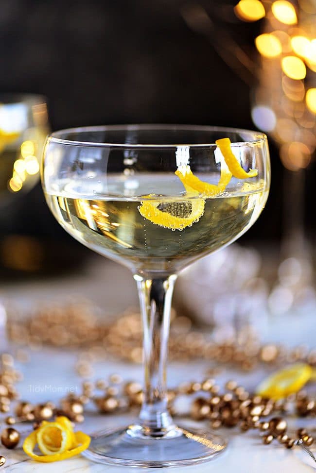 Twinkle champagne cocktail with lemon twist