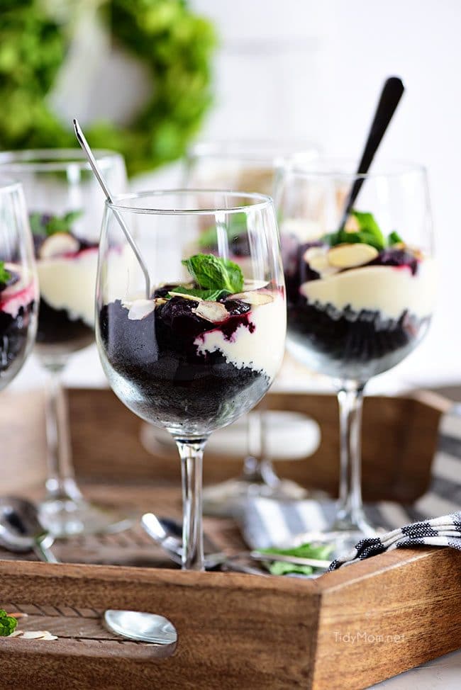 Chocolate Cherry Cheesecake Parfaits in wine glasses