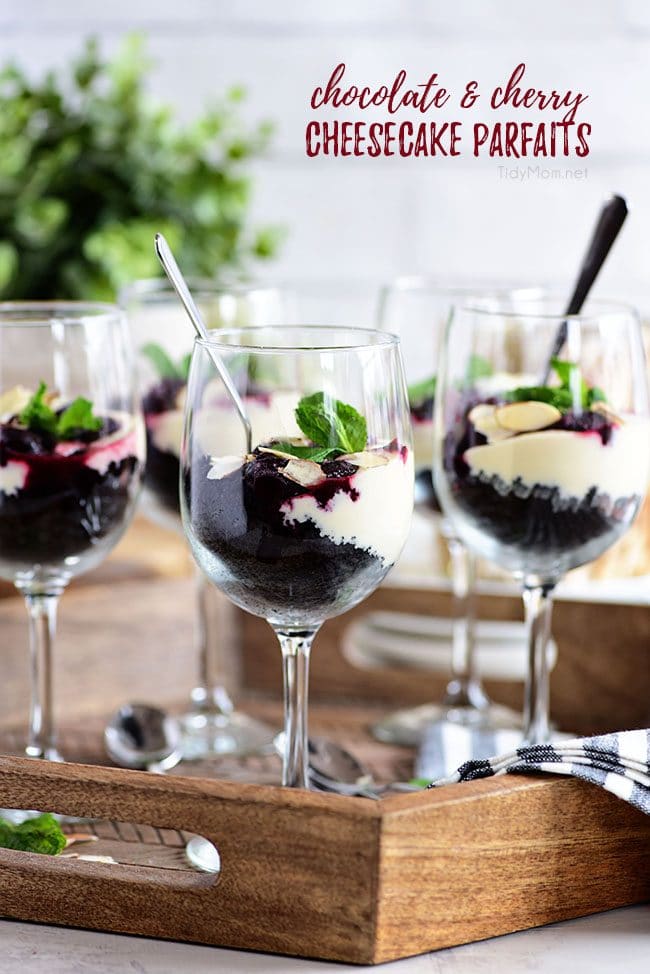 Cherry Cheesecake Parfaits in wine glasses