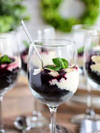 Cheesecake Parfaits in wine glasses