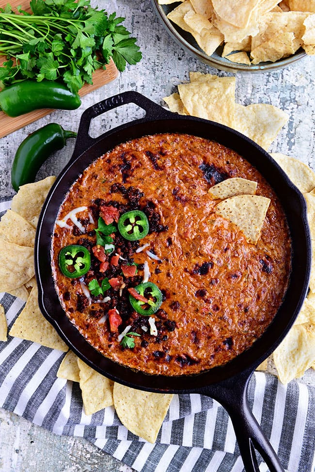 Creamy Chorizo Cheese Dip in cast iron skillet and chips