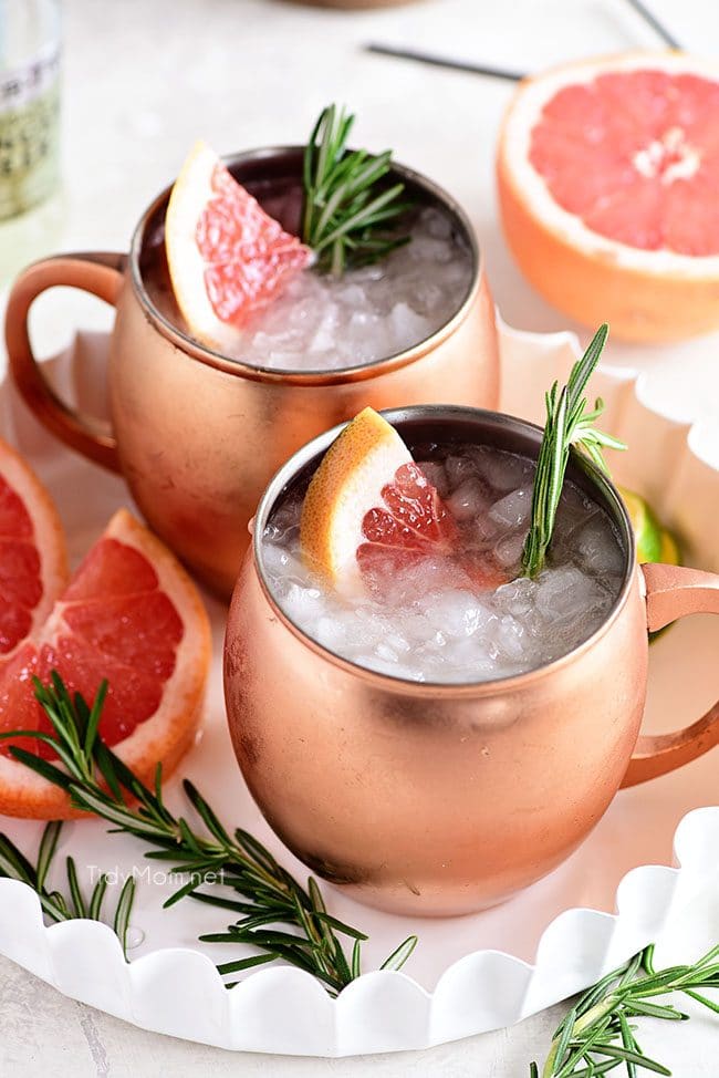 2 Grapefruit Moscow Mule cocktails with fresh grapefruit