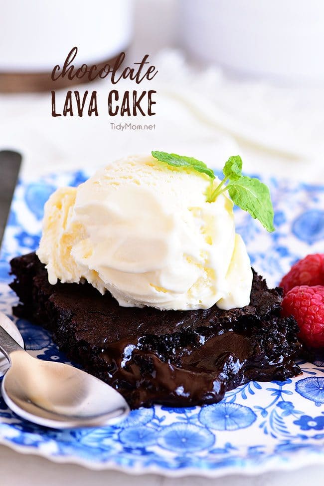 chocolate lava cake on a plate topped with vanilla ice cream
