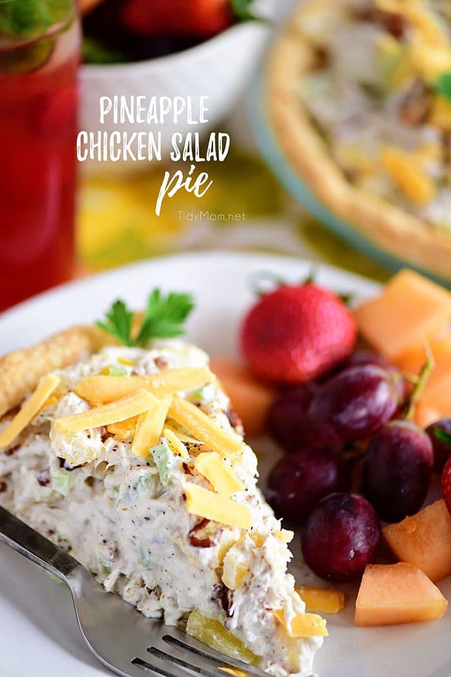 a slice of Pineapple Chicken Salad pie on plate with fruit