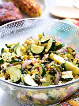 delicious grilled corn and zucchini salad in a bowl