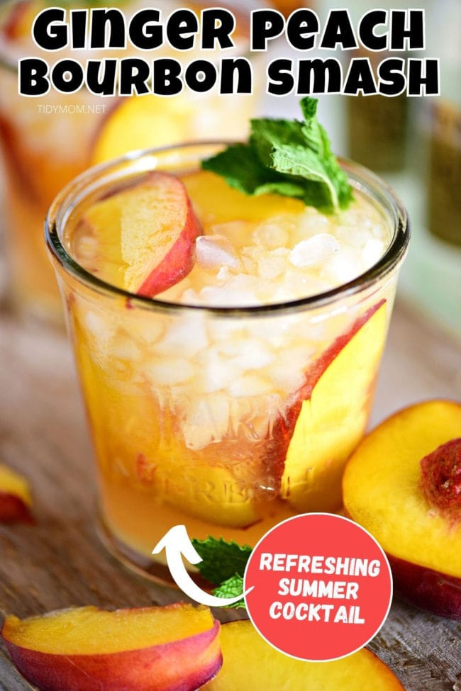 peach cocktail in a glass with fresh peaches
