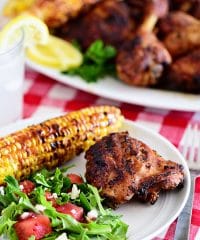 plate of easy lemon herb grilled chicken corn and salad