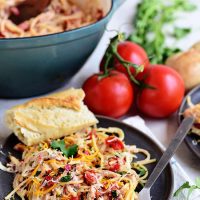 Creamy One-Pot Chicken Spaghetti on a plate with french bread