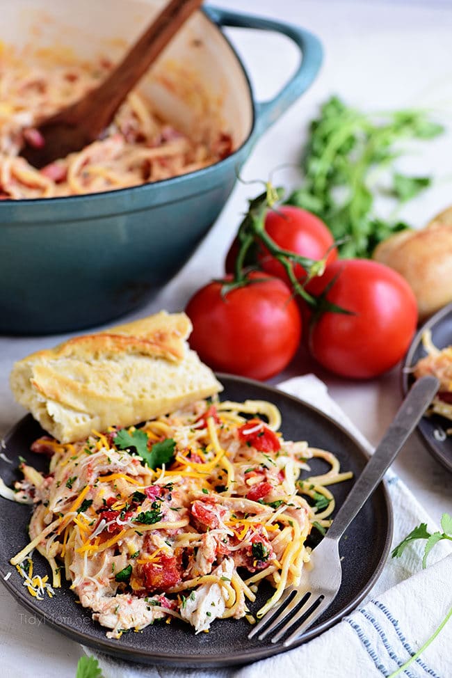 Creamy One-Pot Chicken Spaghetti on a plate with french bread