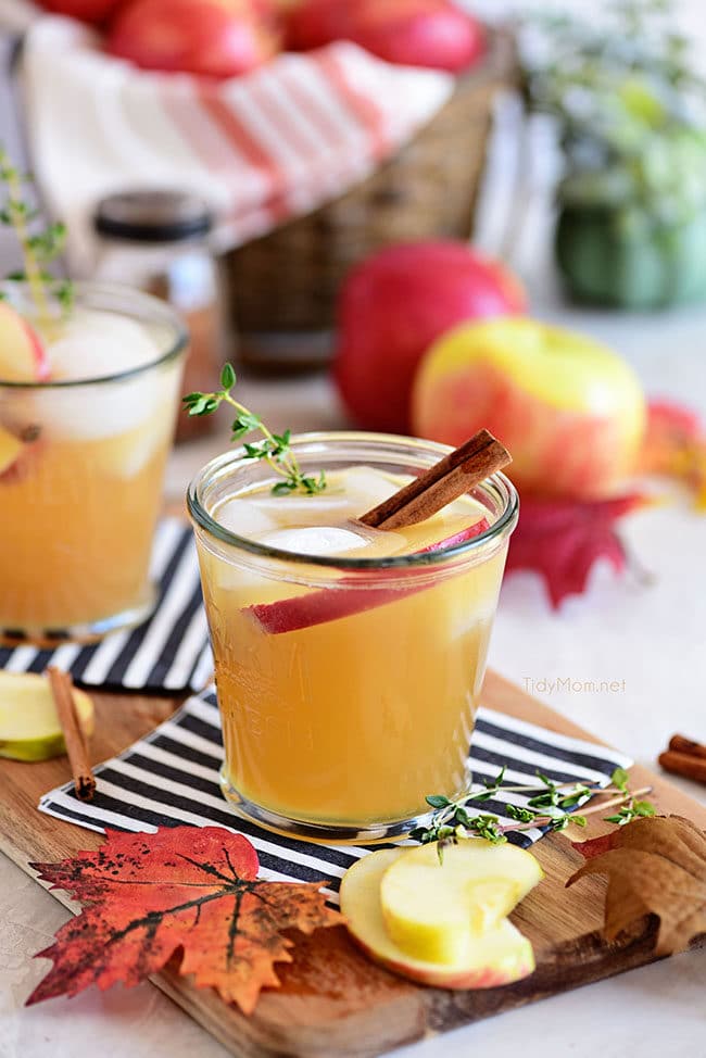 2 glasses of bourbon apple cider cocktail with fall vibes