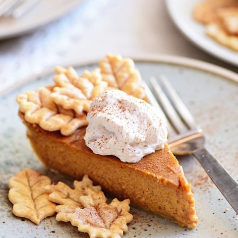 pumpkin pie with leaf cut-outs