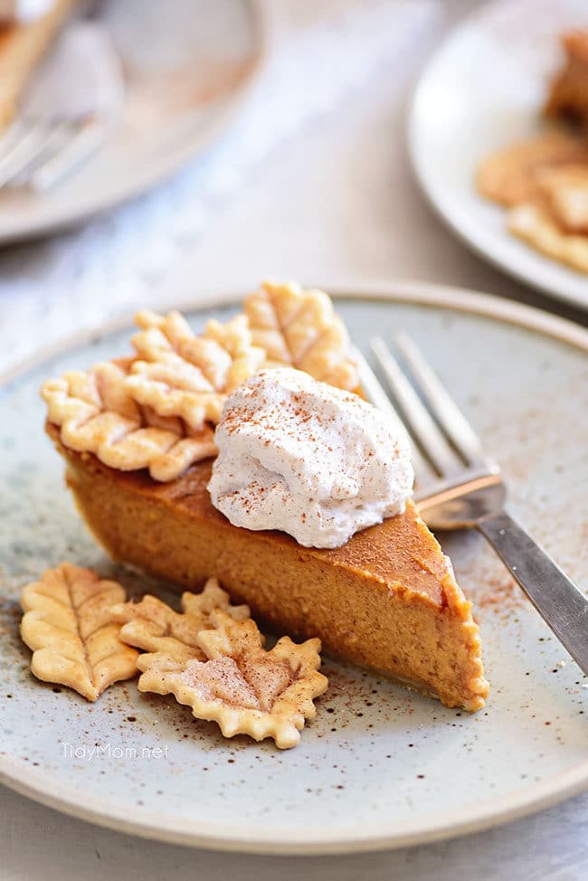 pumpkin pie with leaf cut-out pie crust cookies