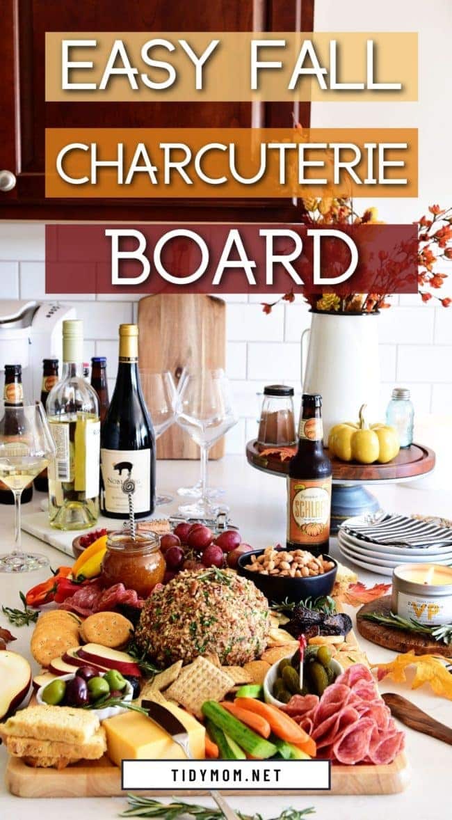 fall charcuterie board with appetizers on a kitchen counter