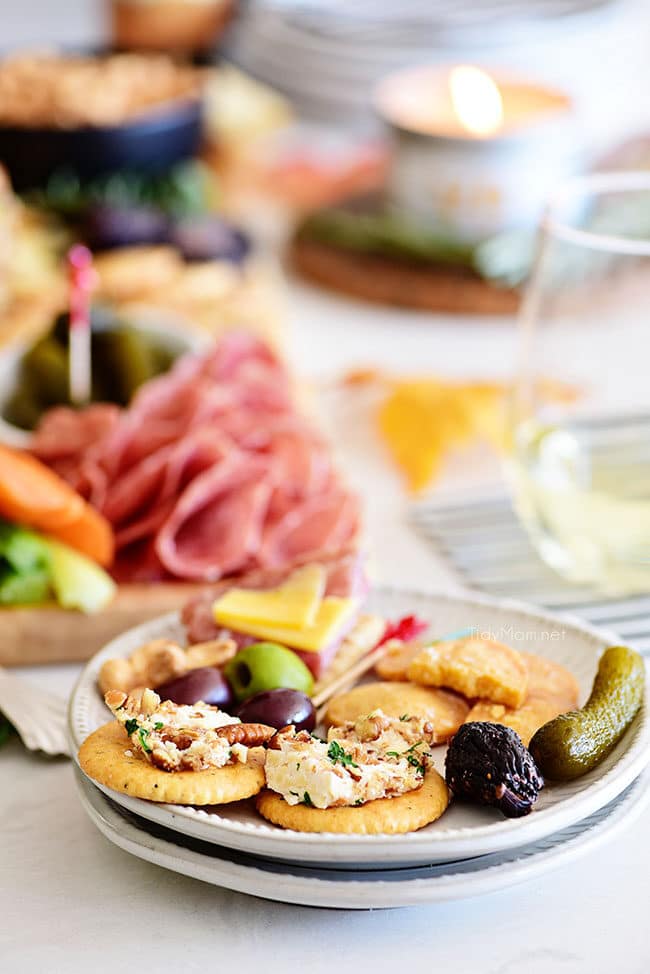 cheese and crackers on a plate from a Charcuterie Board