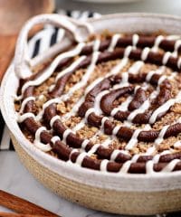 Cinnamon Roll Baked Oatmeal in round dish