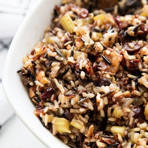 wild rice stuffing in a serving bowl