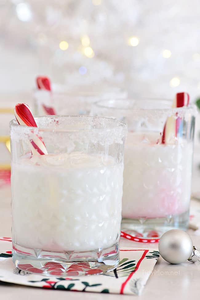 3 snowflake peppermint cocktails with sugar rim