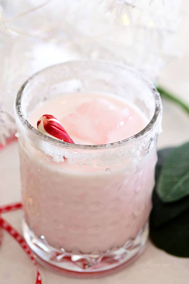 pink peppermint cocktail with candy stick
